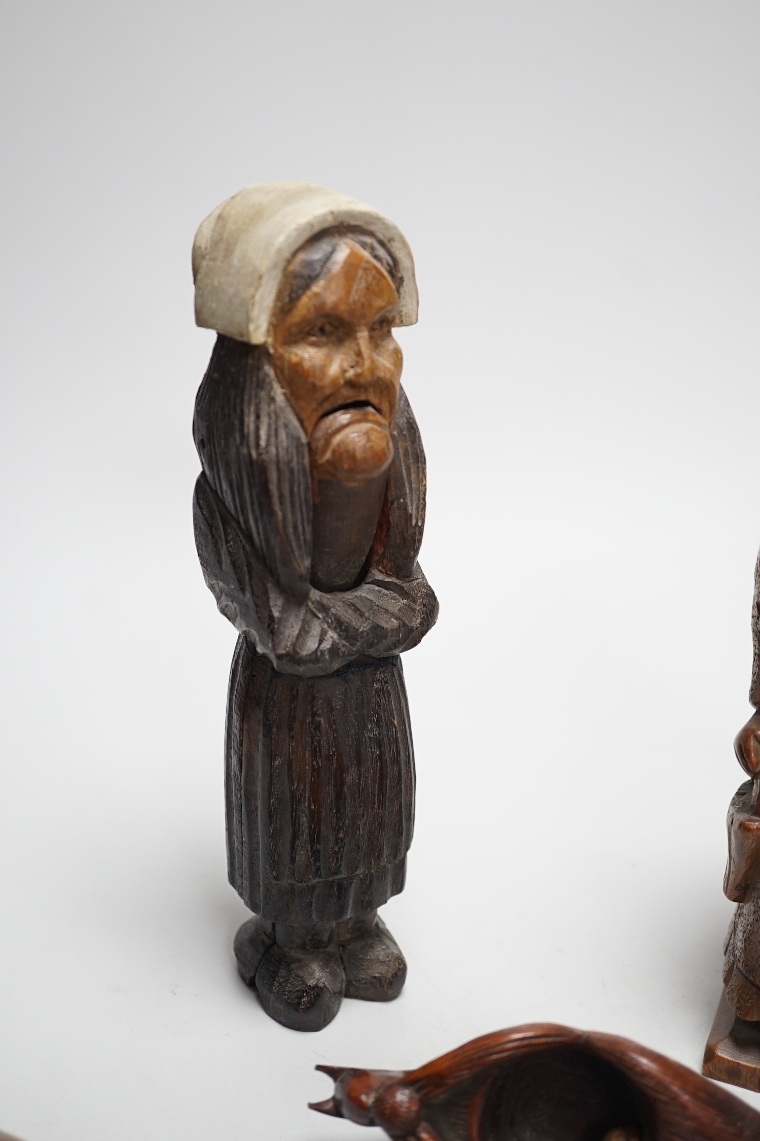 Four late 19th /early 20th century carved wood nutcrackers